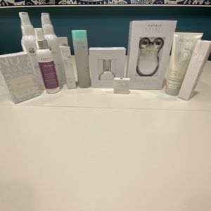 NuFace Stimulator with attachments and face serums